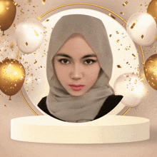a woman in a hijab is surrounded by gold and white balloons and confetti