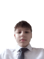 a young boy wearing a white shirt and a black tie