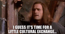 a man with long hair says " i guess it 's time for a little cultural exchange ... "