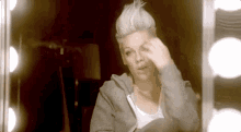 Pink Fix Hair GIF - Pink Fix Hair Looking In The Mirror GIFs