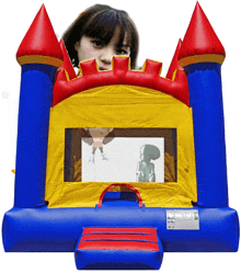 a blue and yellow bouncy house with a woman standing in front of it