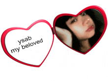 a heart shaped mirror with the words ysab my beloved written on it