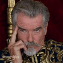 holding anger king rowan pierce brosnan cinderella movie trying to remain clam