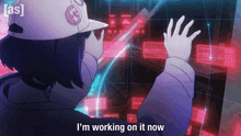 a girl in a baseball cap says i 'm working on it now