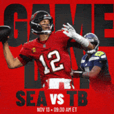 a close up of a football player wearing a helmet with the letter t on it
