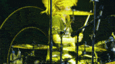 a man playing drums wearing a shirt that says ' punk and rock ' on the front