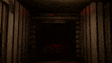 a dark room with a red light shining through a door