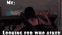 a woman is laying on a couch looking for who asked