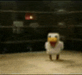 a toy chicken with a yellow beak is standing on a wooden table
