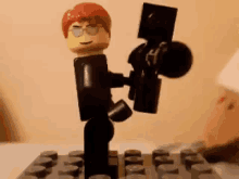 Shoot Lego GIF