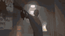 a blurry picture of a person standing in front of a light