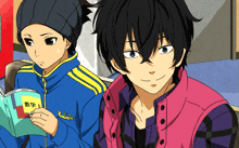 a boy in a blue jacket has rubick 's written on the sleeve