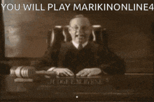 a judge is sitting at a table with a gavel in front of him and the words you will play marikinonline4