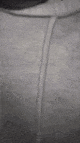 a close up of a person 's pants with a tear coming out of them .