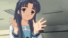 a girl with long blue hair is making a peace sign with her hands