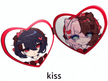 a couple of heart shaped mirrors with the word kiss underneath