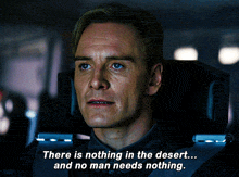 a man sitting in a chair with the words " there is nothing in the desert ... and no man needs nothing " written below him