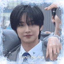 a picture of a man in a suit and tie with the name junil de lex written on it