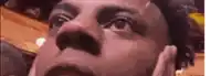 a close up of a man 's face looking up