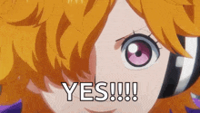 a close up of a girl 's face with the words `` yes ! '' written on it .