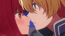 a close up of a boy and girl kissing with the watermark ohmgab on the bottom