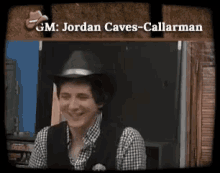 gm jordan caves-callarman is smiling and wearing a hat