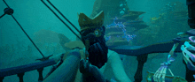 a man with a beard and a crown on his head is standing in the ocean
