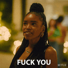 a woman with braids says fuck you in front of a netflix logo