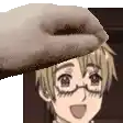 a person is putting a hat on a cartoon character .