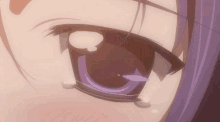 a close up of a person 's eye with a tear running down it