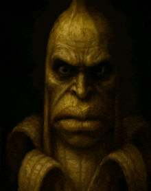 a statue of a man made out of a banana with a very angry face .