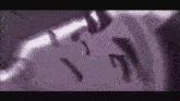 a purple background with a few pieces of paper falling from the sky .