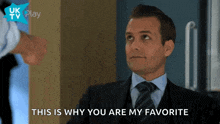 a man in a suit and tie is saying this is why you are my favorite
