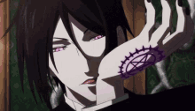 a person with a pentagram tattoo on their hand