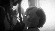 a black and white photo of a woman and child
