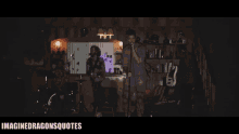 a man singing into a microphone in a room with the words imaginedragonsquotes below him