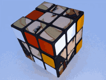 a rubik 's cube with a picture of a girl 's face on it