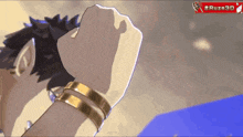 a person 's fist is being held up in front of a sign that says ruze 3d