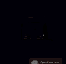 a dark room with a wooden floor and a few lights on the ceiling