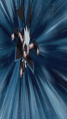 a person in a black cape is flying through a blue light