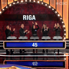 High Five Riga Family GIF - High Five Riga Family Family Feud Canada GIFs