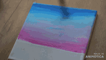 a painting is being painted with quinacridone rose and quinacridone magenta paint