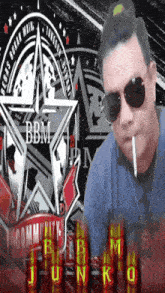 a man is smoking a cigarette in front of a logo that says bbm