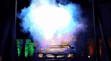 a car with smoke coming out of it 's exhaust pipe