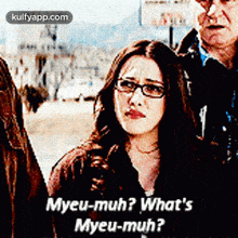 a woman wearing glasses says myeu-muh what 's myeu-muh ..