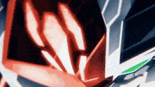 a close up of a person 's face with a red and white background