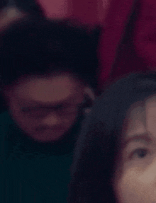 a yellow hand is visible in front of a woman