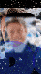 a blurry picture of a man 's face with the letter r in the corner