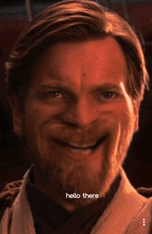 a man with a beard is smiling with the words hello there written below him