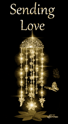 a greeting card that says sending love with a hanging decoration